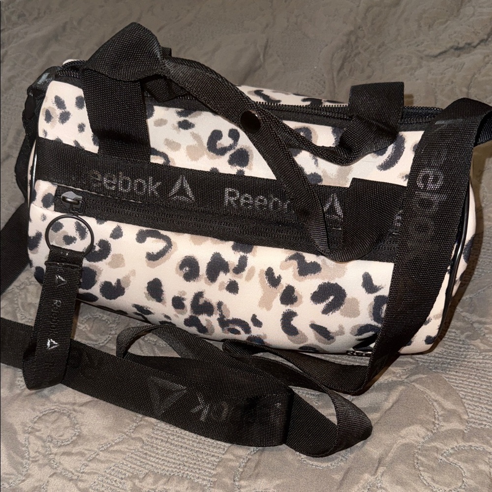 Reebok Leopard Print Mini Duffel in Black and Cream